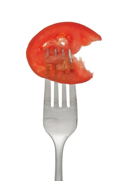 Rebanada de tomate en tenedor — Foto de Stock