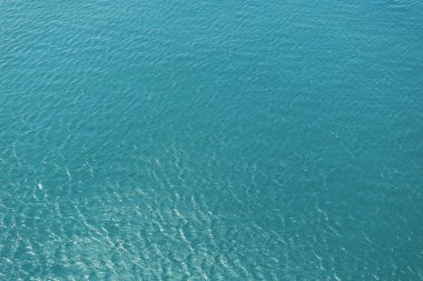 Mavi su dalgalar deniz deniz köpük doku backgr ile parlayan