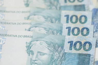 Brezilya para ile makro yakın çekim. 100 faturalar olarak adlandırılan gerçek. Ekonomi kavramı görüntü. 