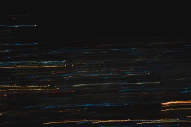 Işıklar siyah arkaplanda. Renk örtüsü ışık deseni.