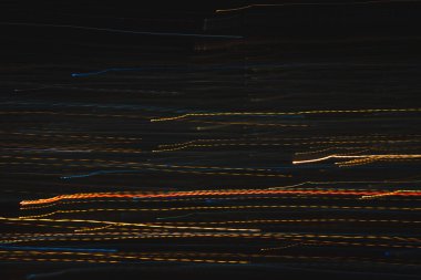 Işıklar siyah arkaplanda. Renk örtüsü ışık deseni.