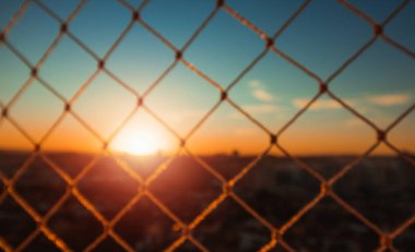 Gün batımı Bokeh bulanık şehir arkaplanı.