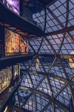 interior of expo centre astana with winter city view in the evening