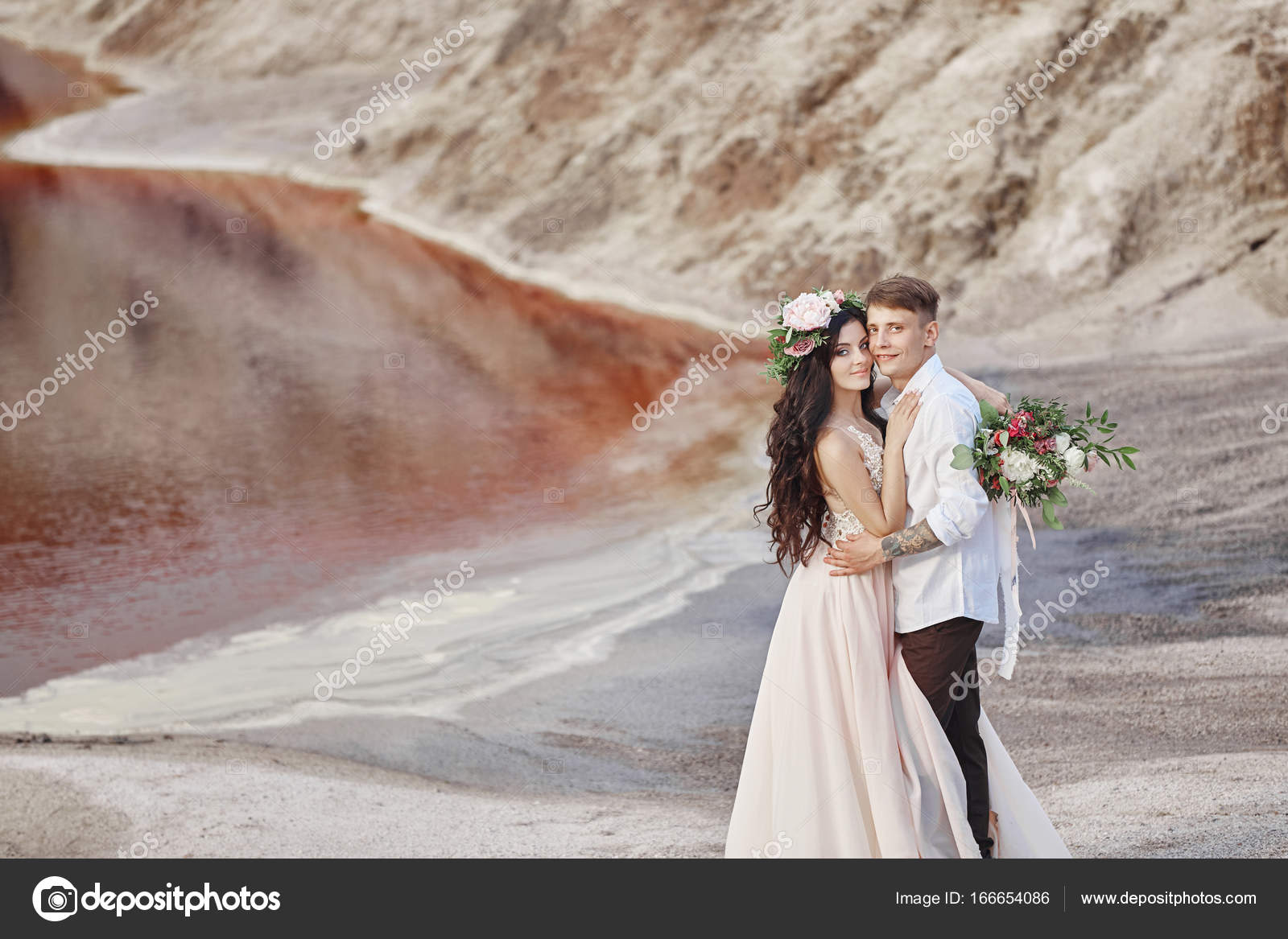 Bride And Groom Walk Along The Red Mountains Fabulous Scene