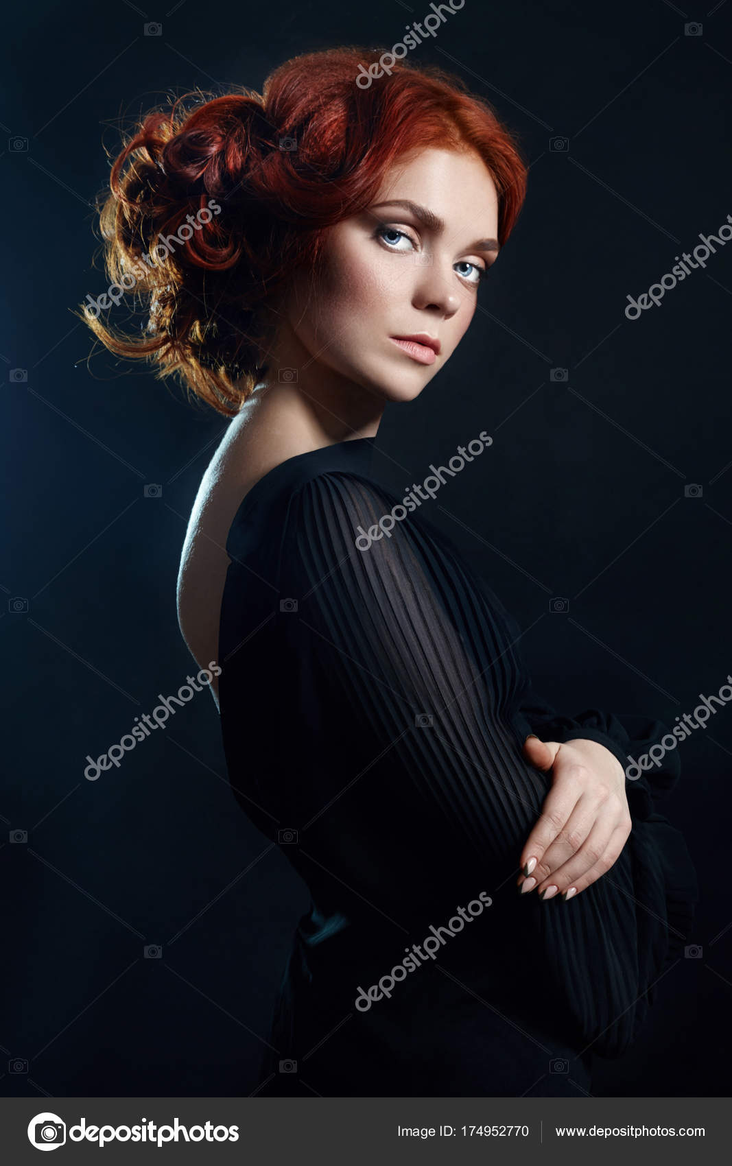 Beautiful Woman With Red Hair On A Black Background Portrait Of A