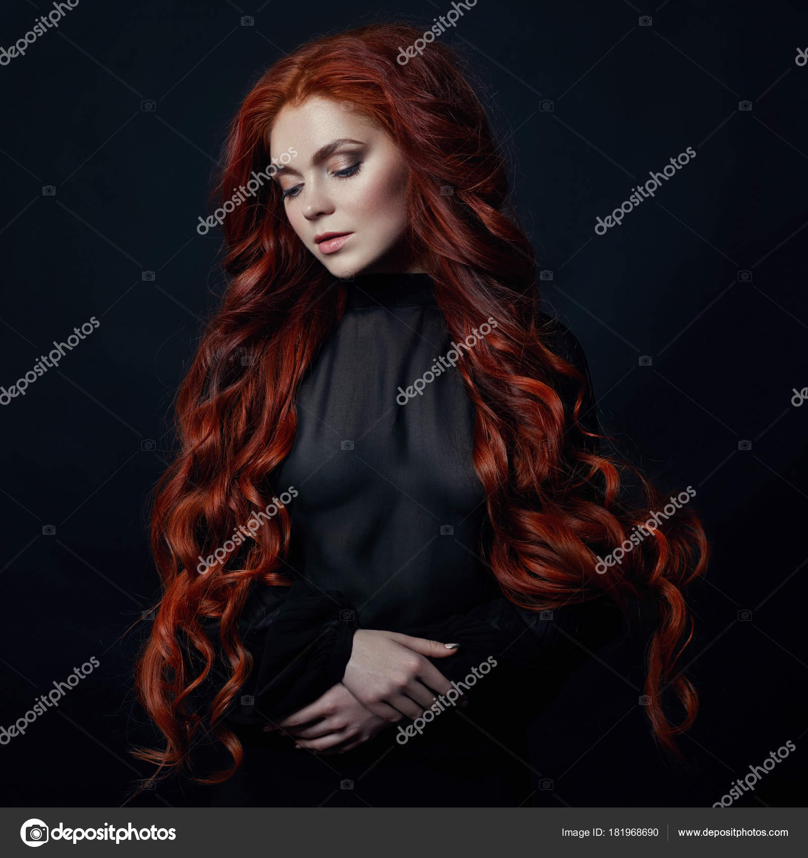 Portrait of redhead woman with long hair black backgroun Stock Photo by ©angel_nt 181968690