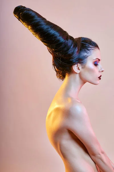 Nude art woman with hair in the form of horns, a female demon wi — Stock Photo, Image