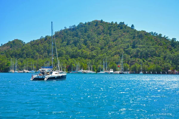 stock image Blue Mediterranean sea with mountains and yachts