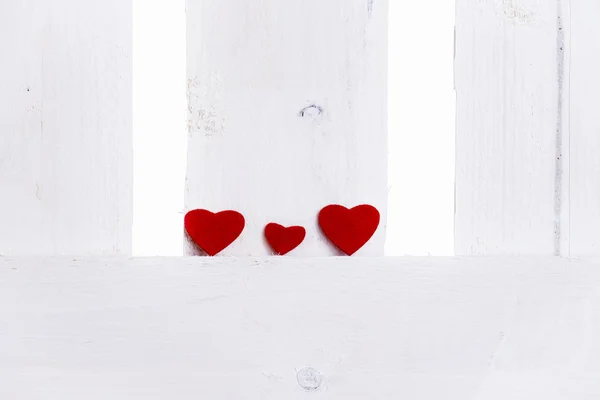 Dos corazones grandes y uno pequeño — Foto de Stock
