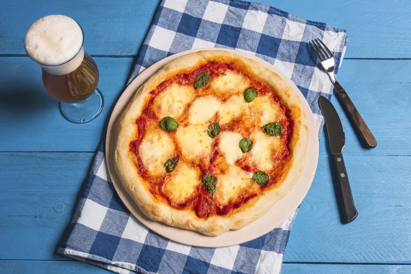 Pizza Margherita and beer. Cheese pizza. Mozzarella pizza.