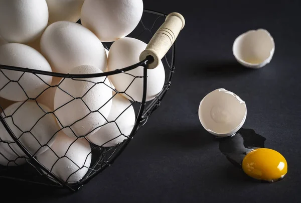 Chicken Eggs Metal Basket Black Wooden Table Cracked Egg Directly — Stock Photo, Image