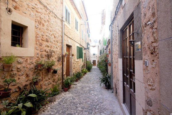 Beautiful street in Valldemossa, famous old mediterranean village of Majorca Spain