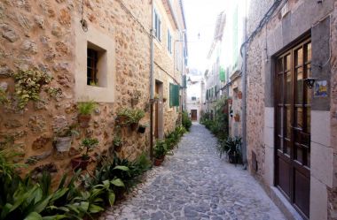 Beautiful street in Valldemossa, famous old mediterranean village of Majorca Spain. clipart