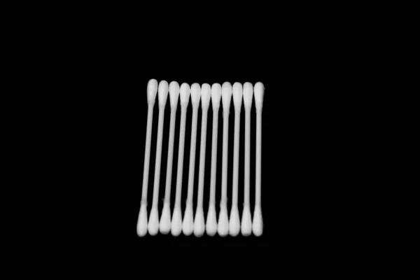 Cotton sticks isolated on the black background — Stock Photo, Image