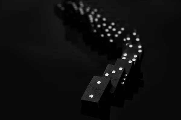 Black Vintage Falling Dominoes Black Background Selective Focus Photo — Stock Photo, Image