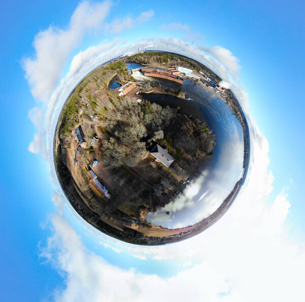 A three dimensional panoramic view of hydroelectric power generation plant and Ankkapurha Industrial Museum at Kymijoki river, Finland in a mini planet panorama style.