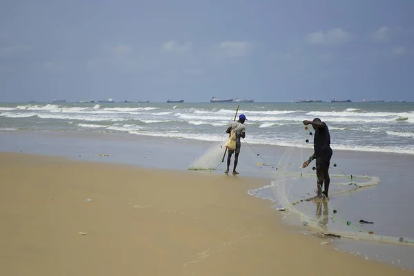 Fishermen Catch Fish Nets Africa Cost Big Cargo Ships Oil — Stock Photo, Image