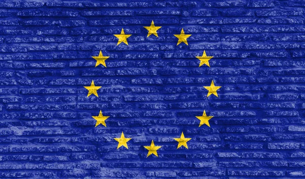 在古老的砖墙上彩绘了欧洲联盟的国旗 说明1 — 图库照片