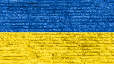 Eski tuğla duvarda Ukrayna 'nın renkli ulusal bayrağı var. Görüntü.