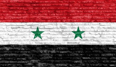 Suriye 'nin renkli ulusal bayrağı eski tuğla duvarda. Görüntü.