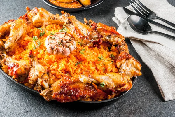 Jollof rice with chicken and plantains