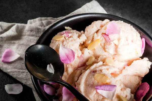 Ice cream with rose petals Stock Photo