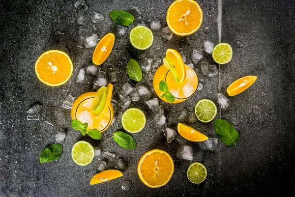 Summer citrus punch with oranges and lime — Stock Photo, Image
