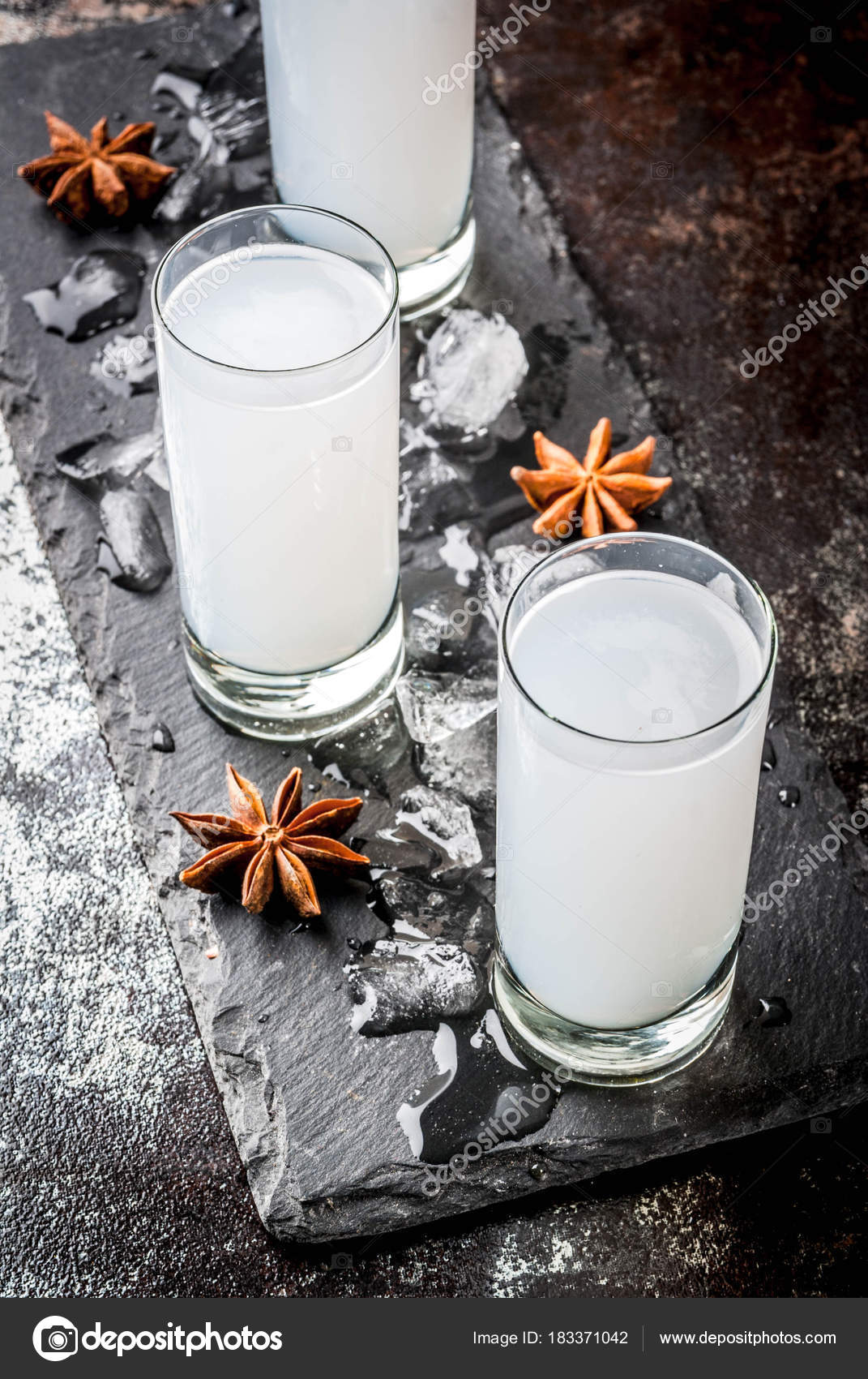 Traditional arabic alcohol drink Raki with anise, dark rusty bac Stock ...