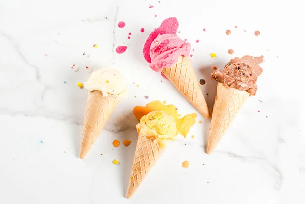 Homemade berry and chocolate ice cream in waffle cones, white ma — Stock Photo, Image