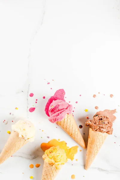 Homemade berry and chocolate ice cream in waffle cones, white ma — Stock Photo, Image