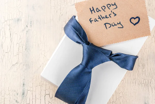 Father\'s Day gift concept, greeting card background, gift box, t
