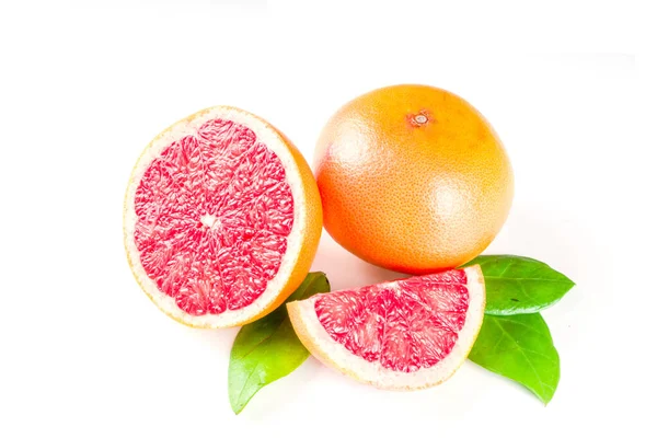 Whole and sliced grapefruit — Stock Photo, Image