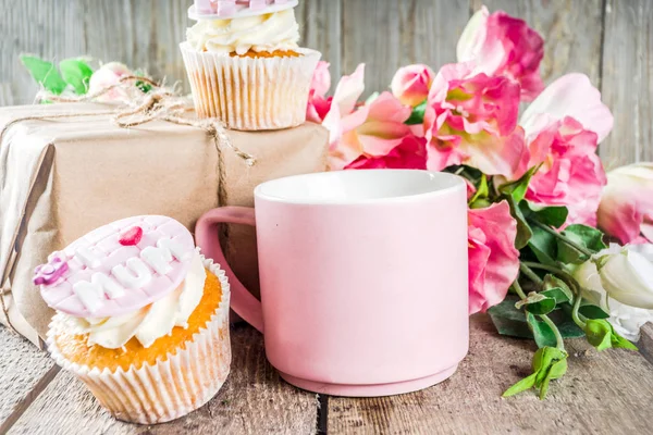 Happy moms day background with cupcakes