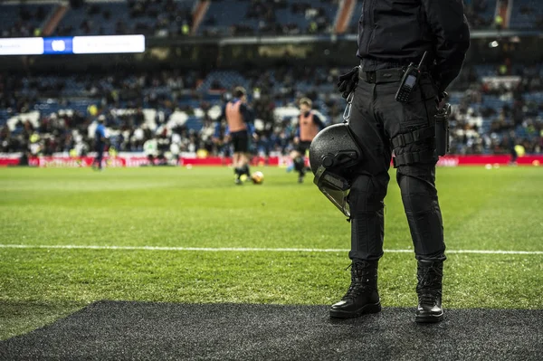 Policeman in the soccer field — Stock Photo, Image