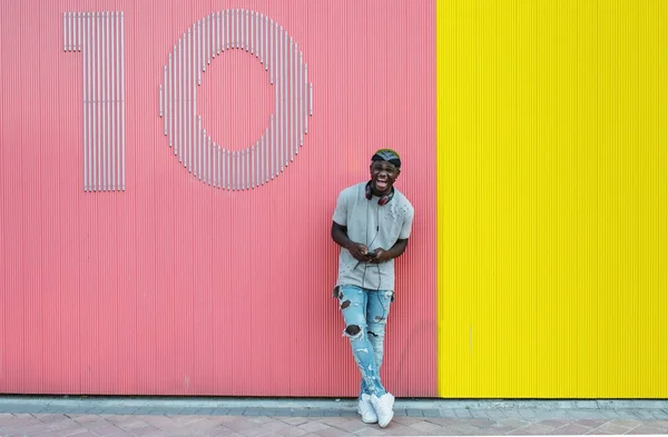 African young man with mobile phone — Stock Photo, Image