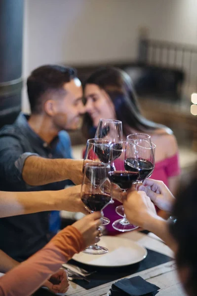 friends toasting with wine