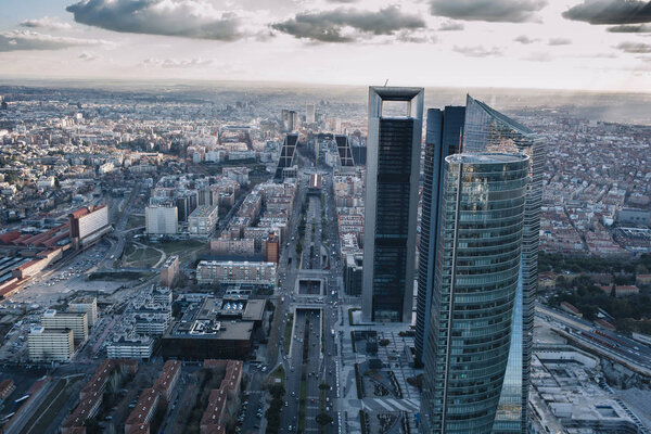 Madrid Skyline at sunset with some emblematic buildings such as 