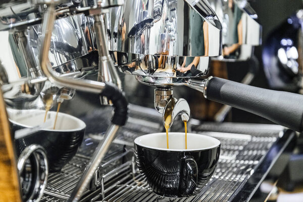 Close up image of espresso coffee brewing