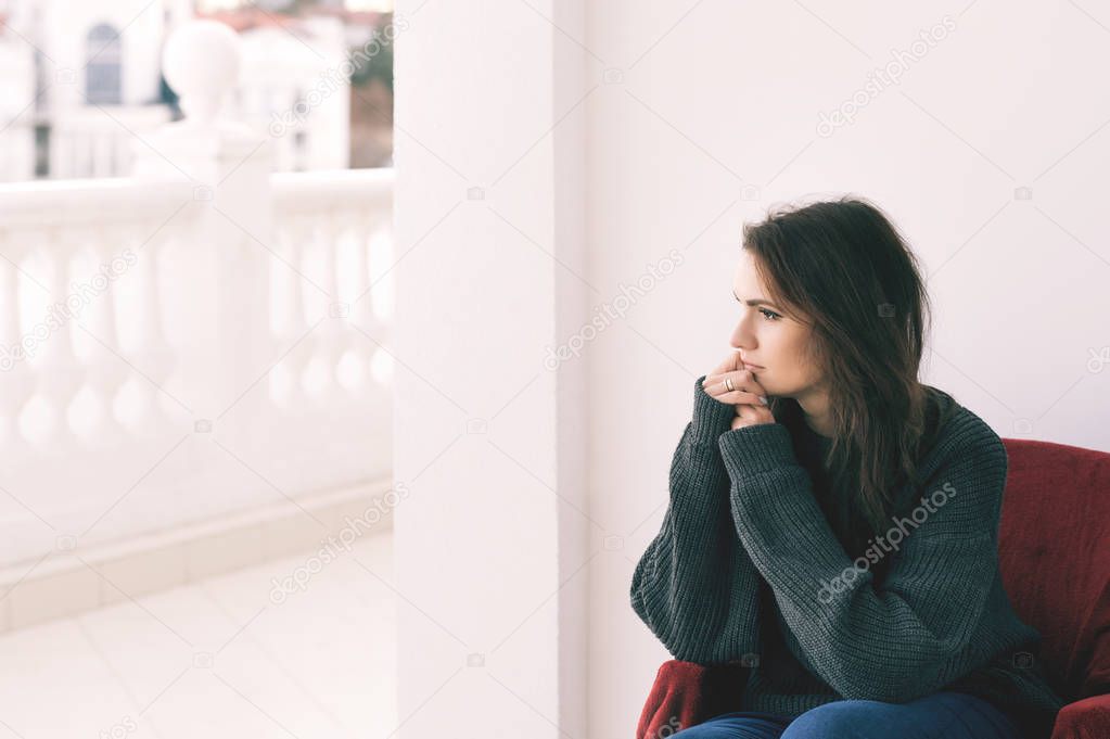 Beautiful woman in gray sweater