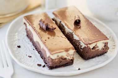 Chocolate vanilla cheesecake slices clipart