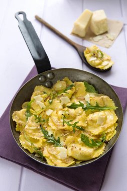 Parmesan rocket raviolis