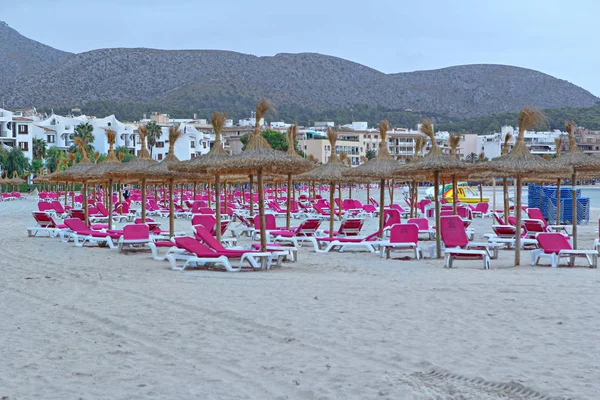 Deck chairs on the beach in Spain