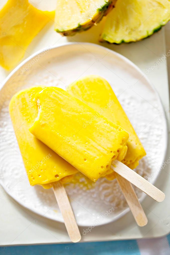 Mango pineapple ice cream popsicles 