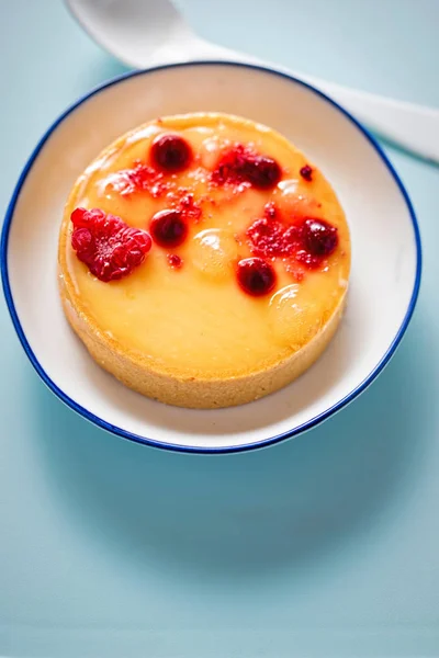 Lemon tart with red fruits — Stock Photo, Image