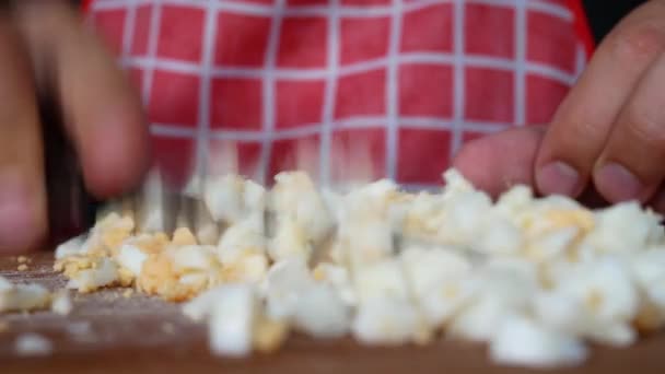 Boiled Egg Cutting on Chopping Board With Knife Close Up — Stock Video