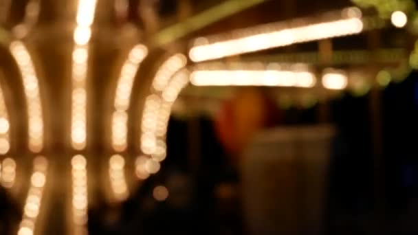 Blurred French Carousel. Bokeh Lights Glowing Carousel — Stock Video