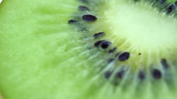 Kiwi jugoso gira como fondo — Vídeos de Stock