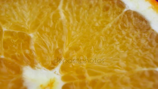 Φέτα πορτοκάλι περιστρέφεται — Αρχείο Βίντεο