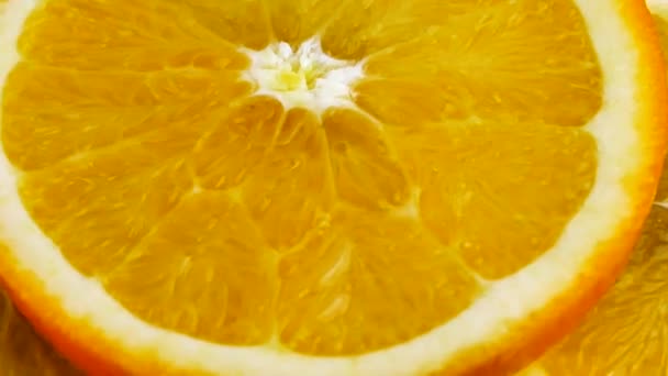 Orange slices rotations — Stock Video