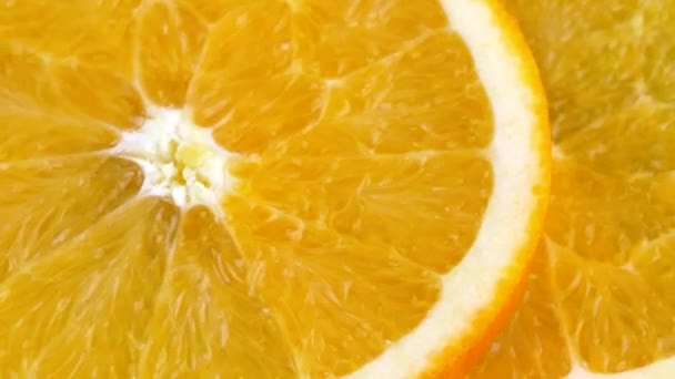 Orange slices rotations — Stock Video